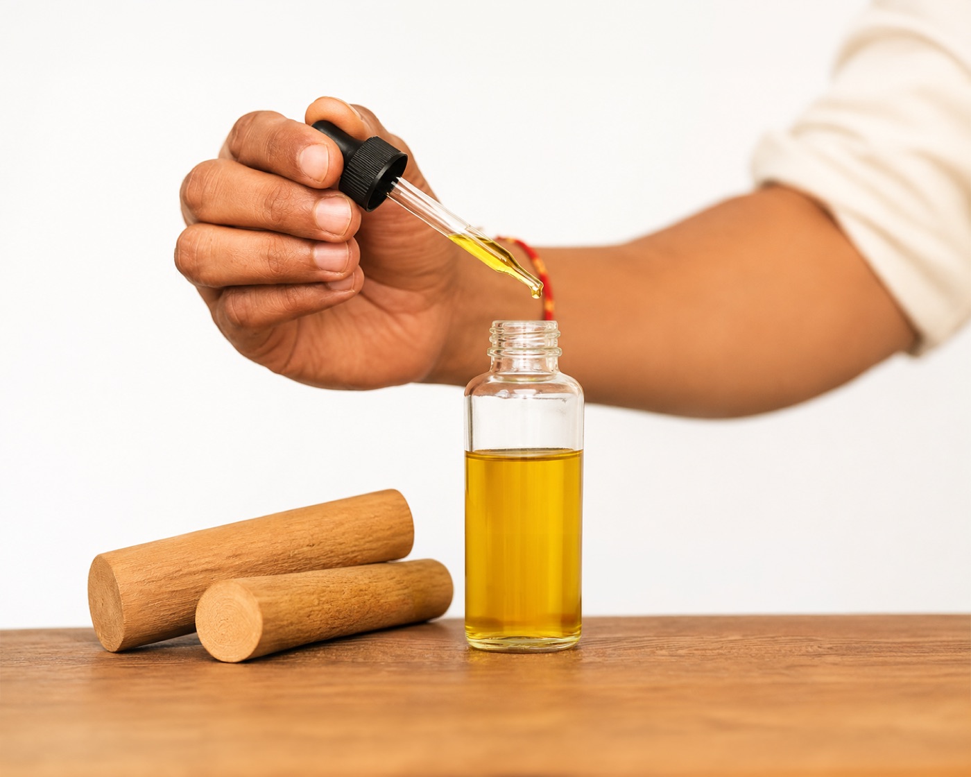 Liquid Gold - pure essential oil being dispensed drop by drop